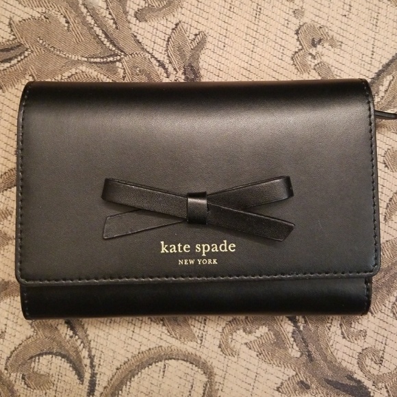 kate spade Handbags - Kate Spade Bow detail wallet